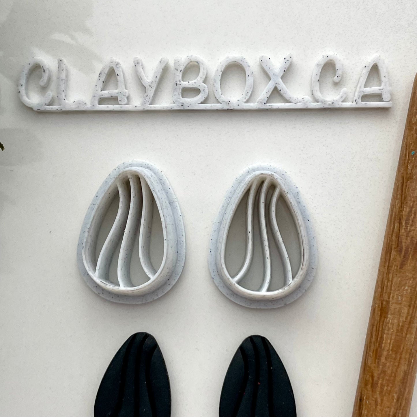 Fluid teardrop cutter pair