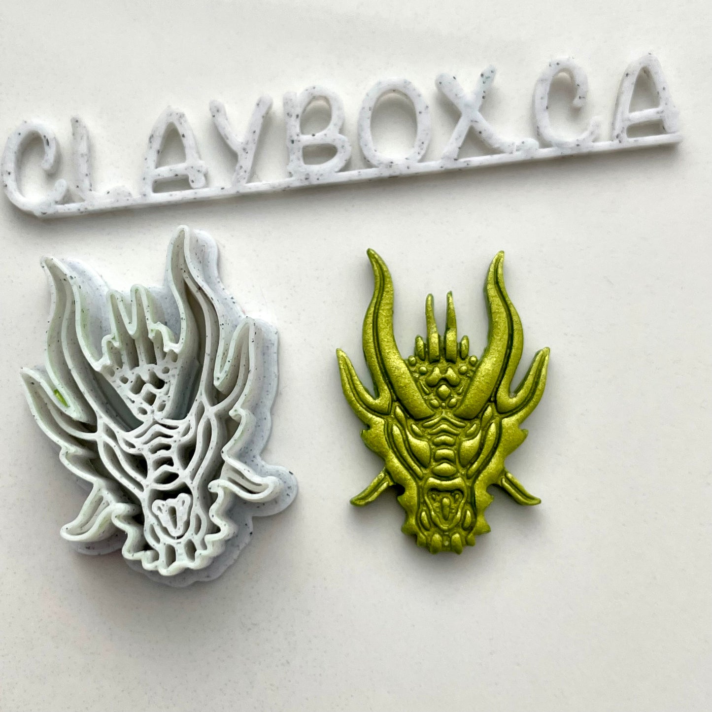 Dragon head combined stamp/cutter