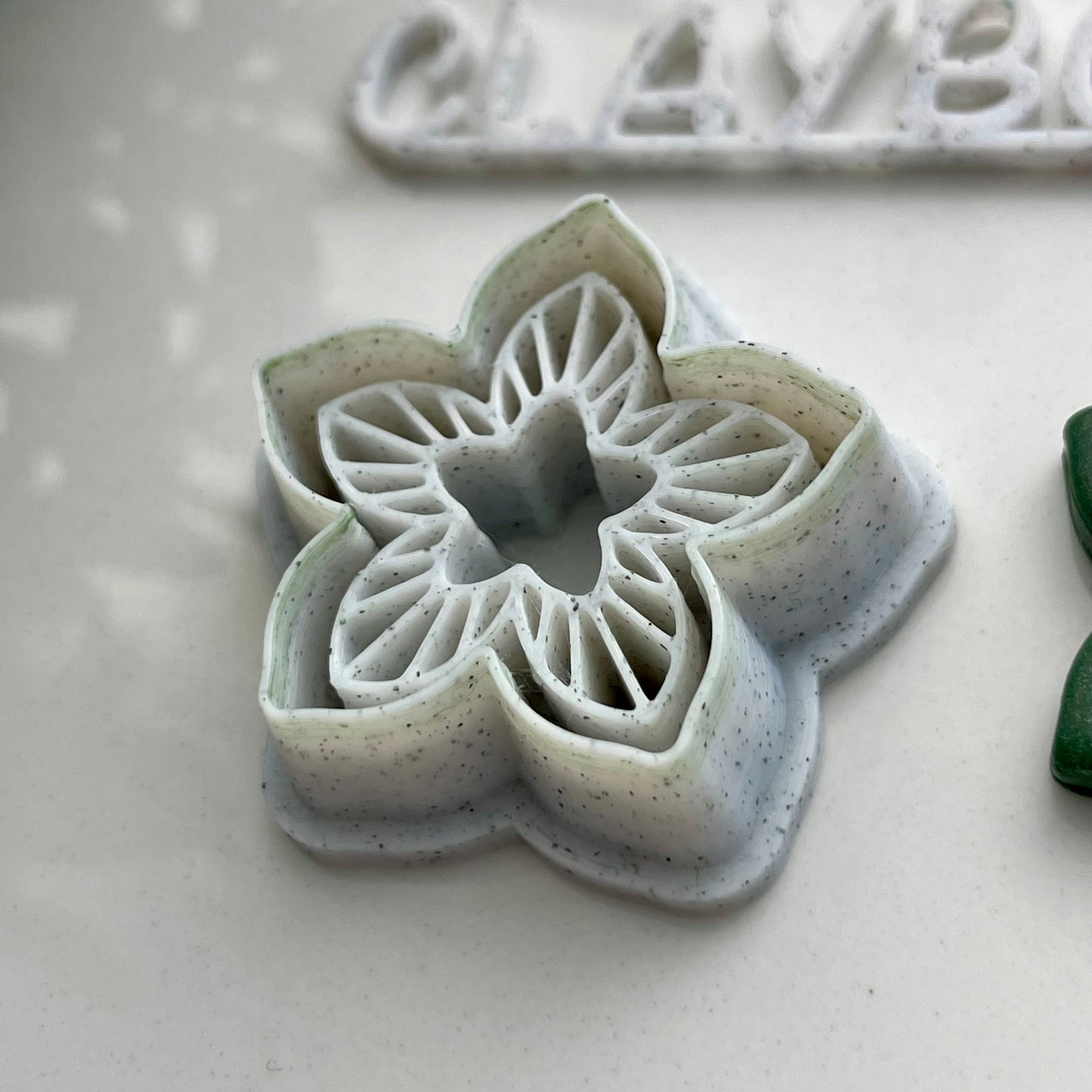 Star flower combined stamp/cutter