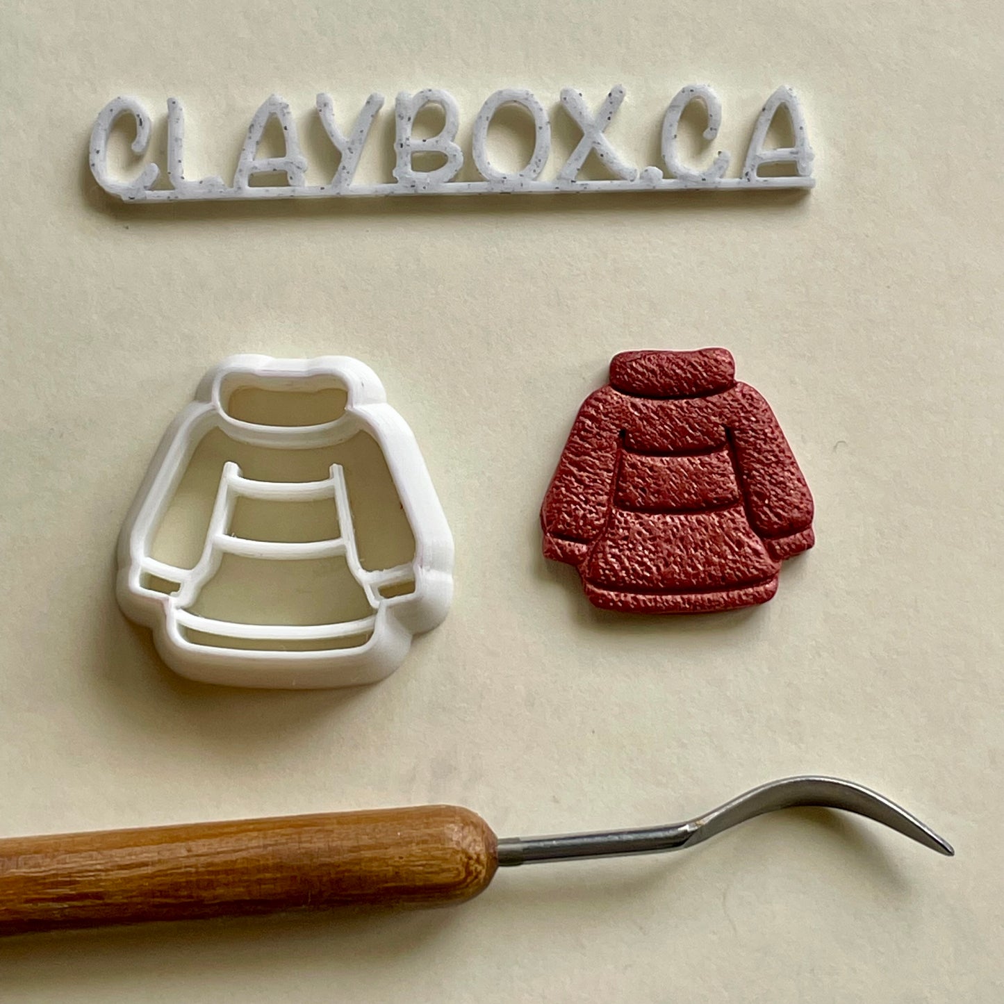 Cozy sweater combined stamp/cutter