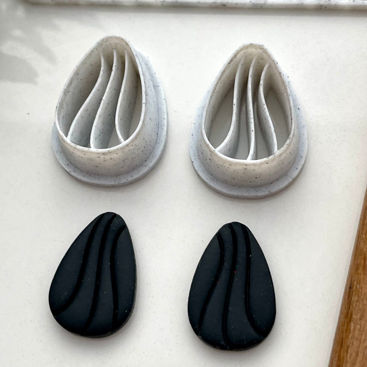 Fluid teardrop cutter pair