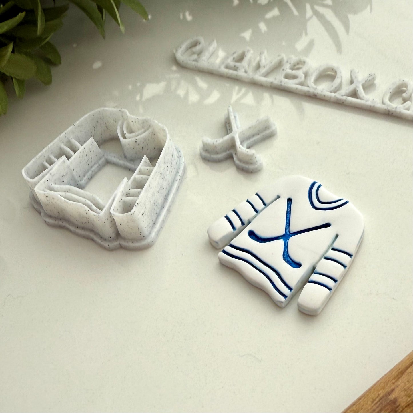 Hockey jersey cutter with hockey sticks stamp - for polymer clay