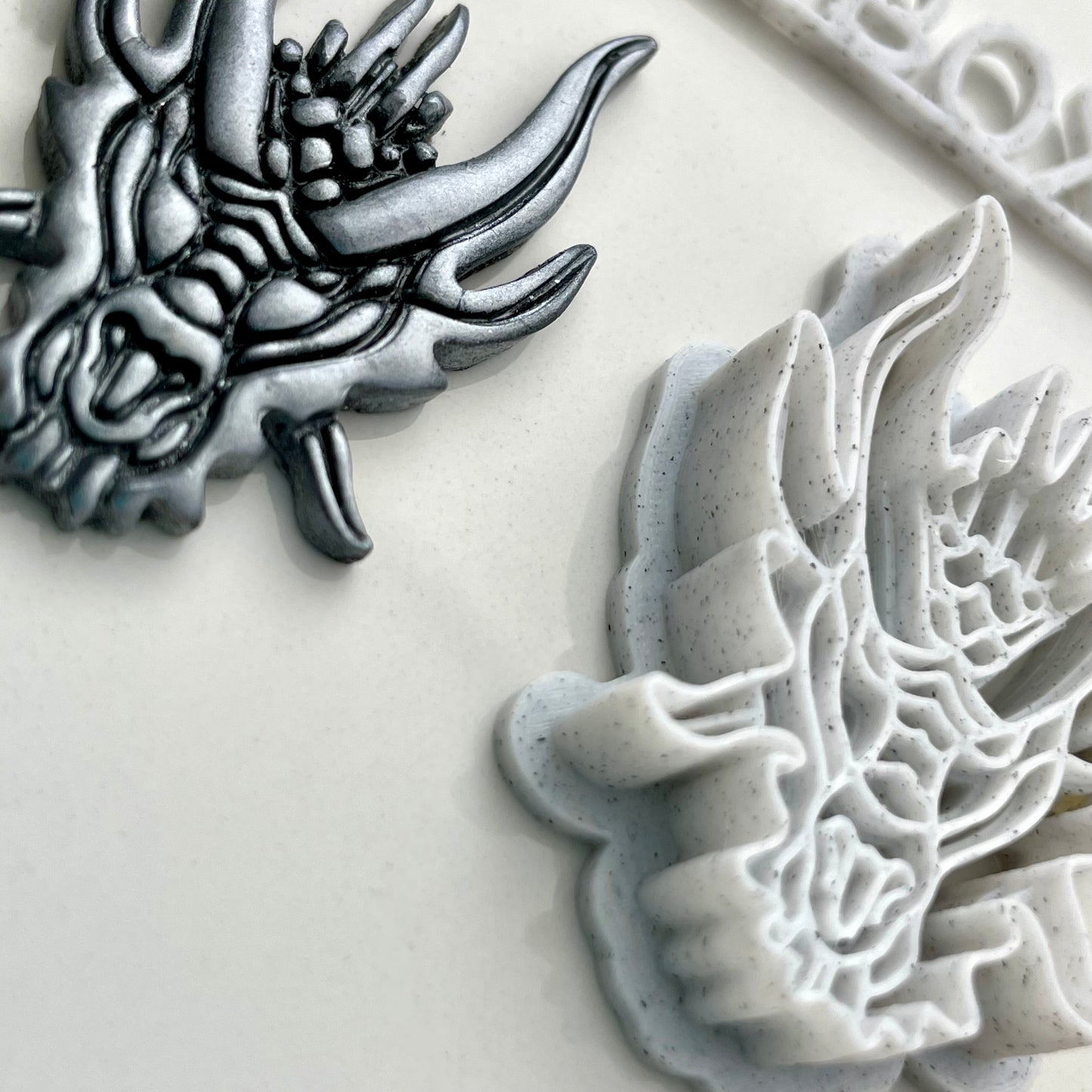 Dragon head combined stamp/cutter