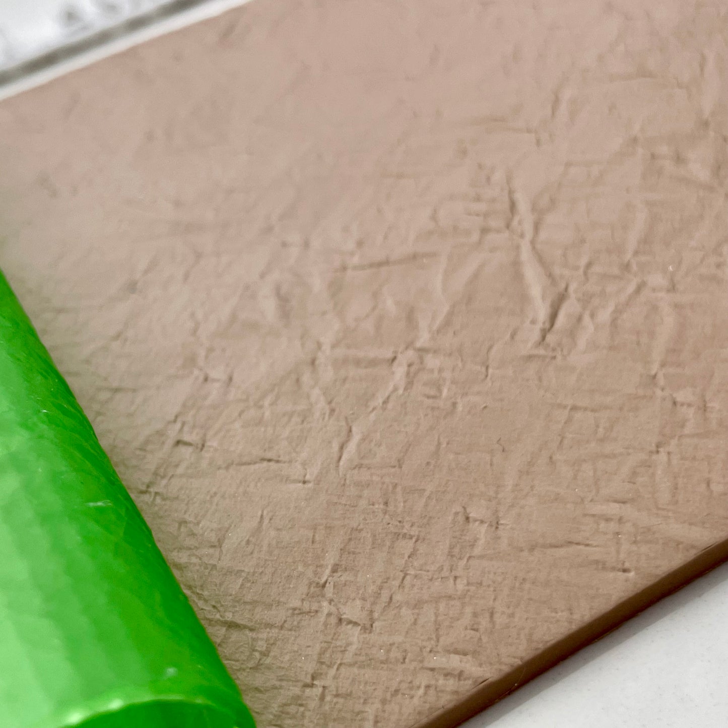 Crumpled paper roller