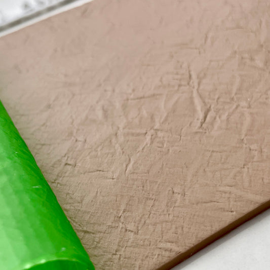 Crumpled paper roller