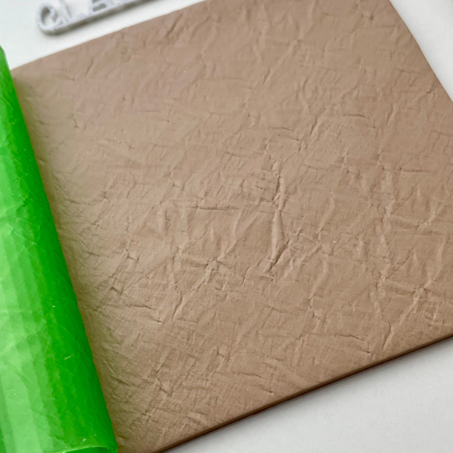 Crumpled paper roller