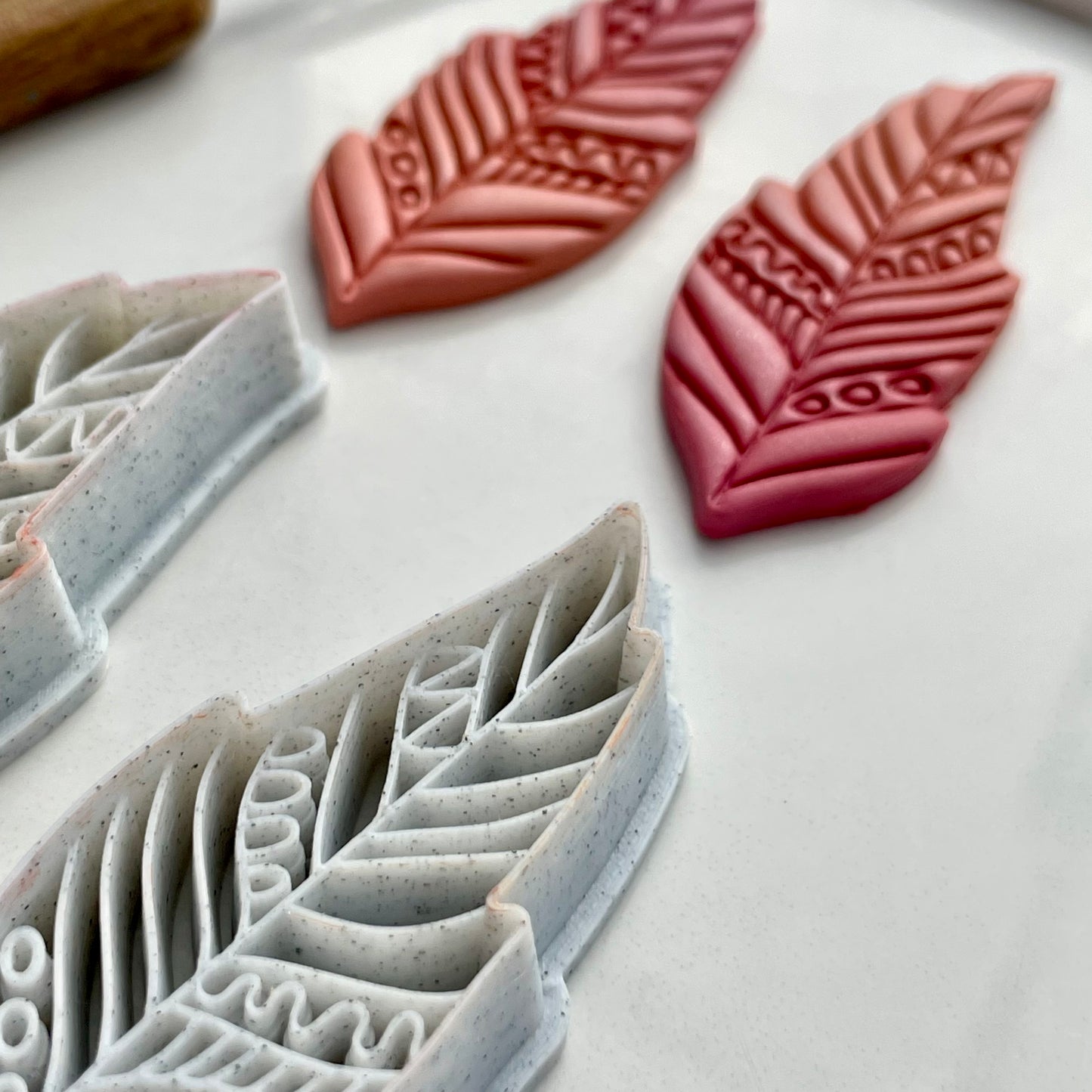 Tribal feather cutter pair