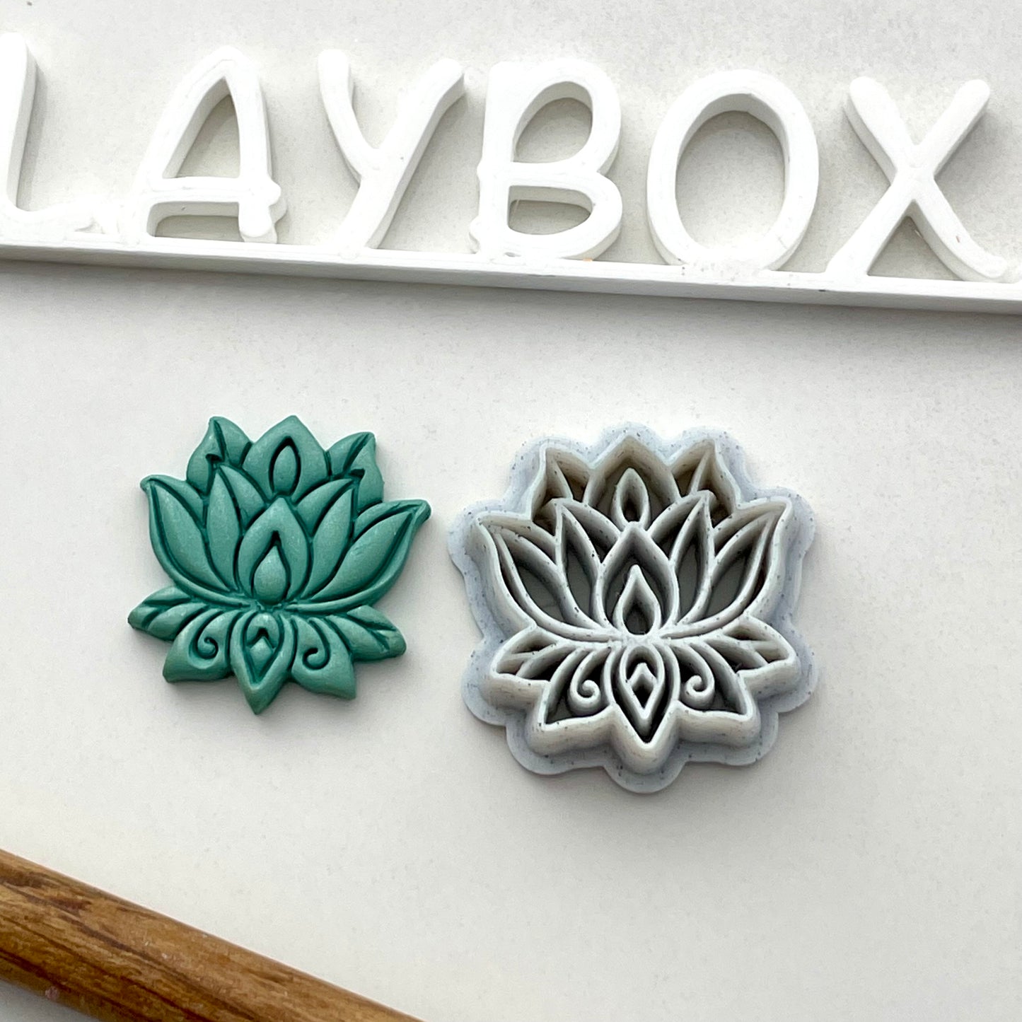 Lotus combined stamp/cutter