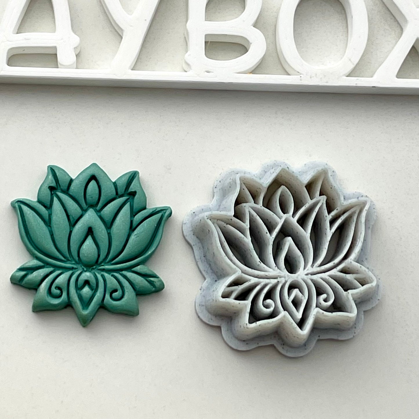 Lotus combined stamp/cutter