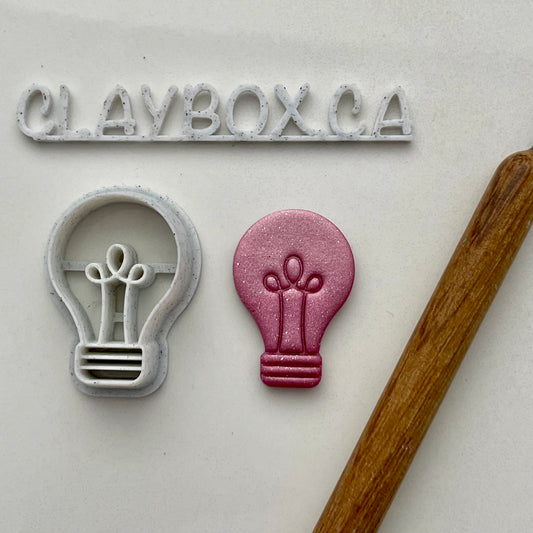 Lightbulb combined stamp/cutter