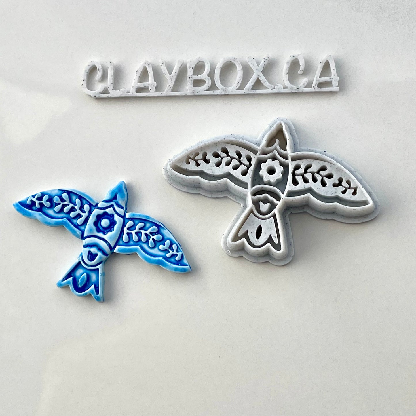 Spring folk art bird combined stamp/cutter