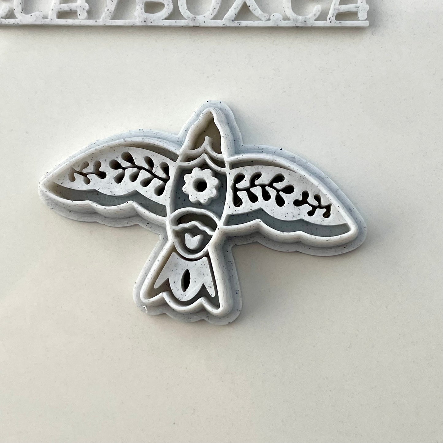 Spring folk art bird combined stamp/cutter