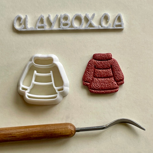 Cozy sweater combined stamp/cutter