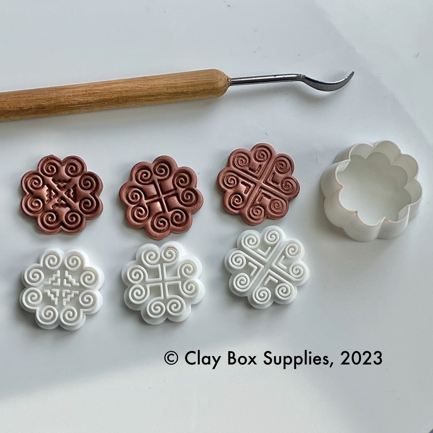 Hmong embroidery stamps with matching cutter